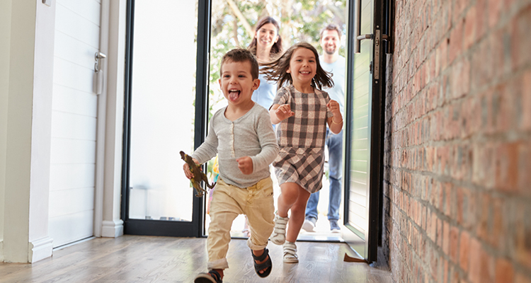 kids excitedly running into home